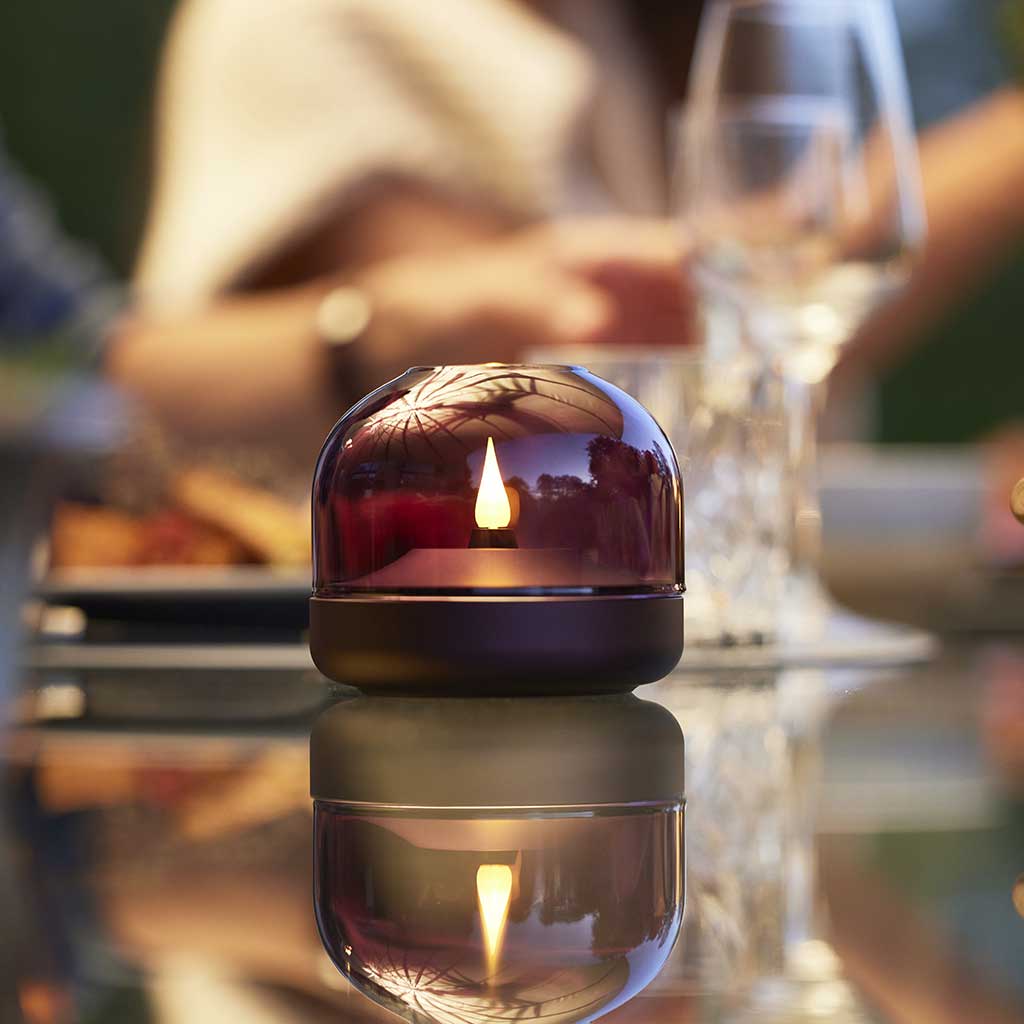 Add a touch of elegance to your home with the Kooduu Glow 08 Flameless Candles. This Danish-inspired candle holder is compatible with the rechargeable Shine LED candle, making it safer and more durable than traditional candles. With a modern design and many classy colors to choose from, it's the perfect addition to any décor.