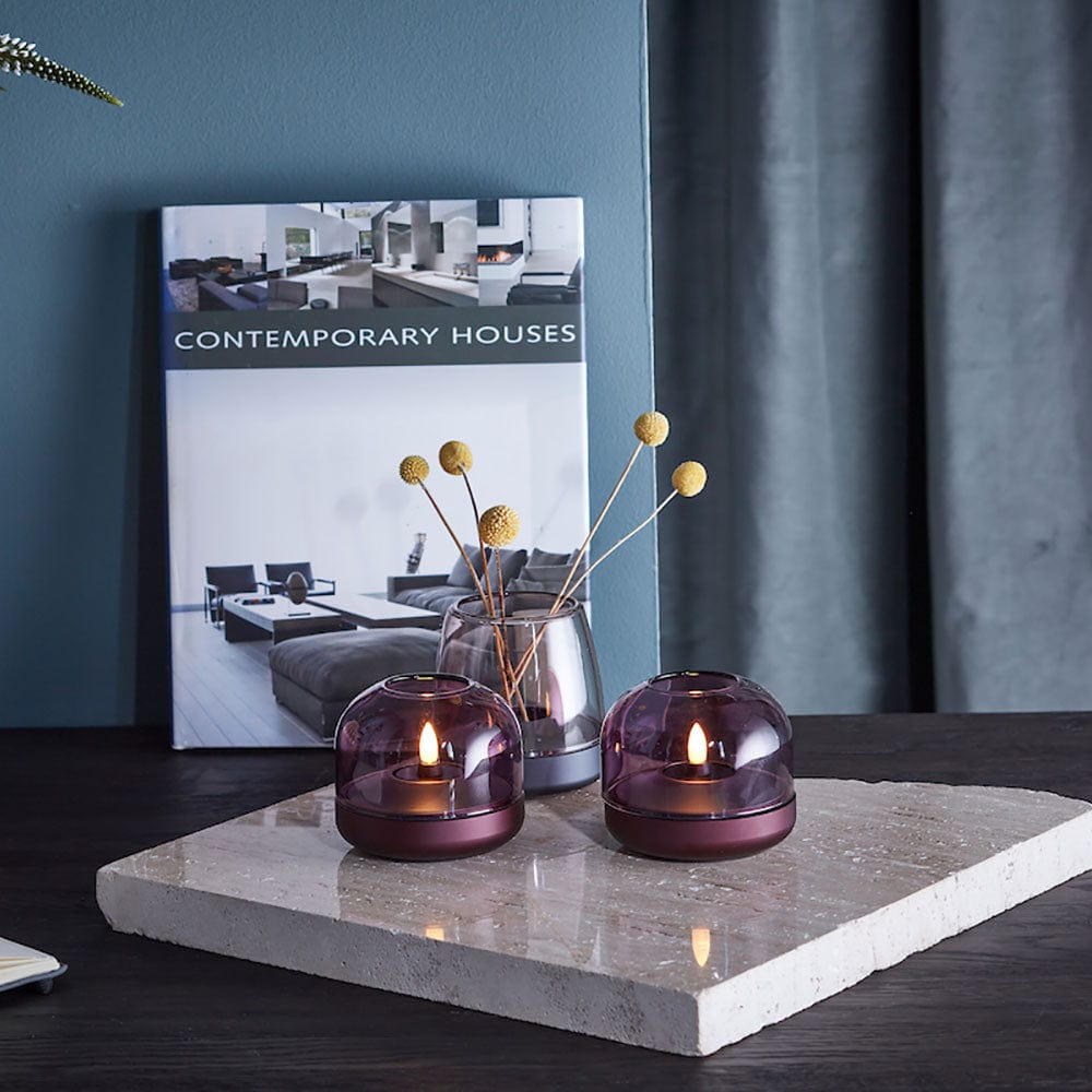 The Kooduu Glow 10 candle holder is a modern and safer alternative to traditional candles. Its unique Danish-inspired design adds elegance to any décor.